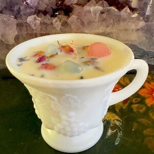 Handmade candle poured in antique tea cup